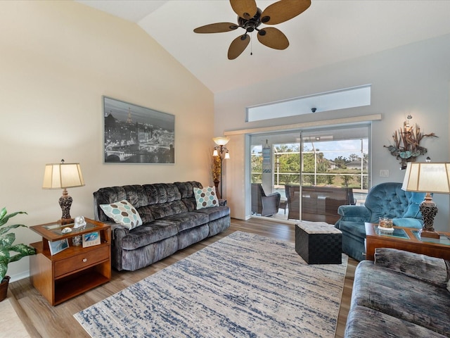 85 Long Meadow Ct, Rotonda West, FL 33947 - living room featuring wood finished floors, high vaulted ceiling, and ceiling fan