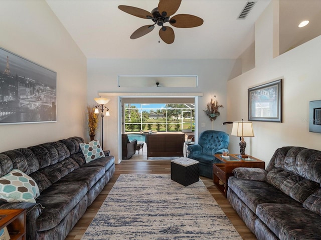 85 Long Meadow Ct, Rotonda West, FL 33947 - living area with wood finished floors, ceiling fan, and lofted ceiling