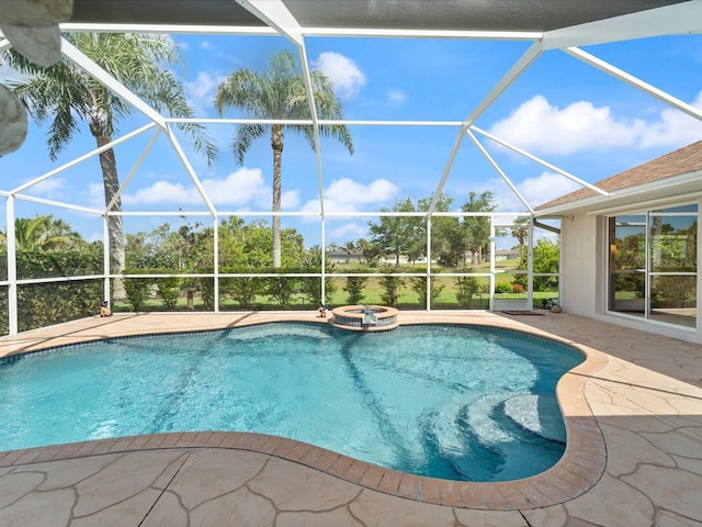 85 Long Meadow Ct, Rotonda West, FL 33947 - view of pool with glass enclosure, a patio, and a pool with connected hot tub
