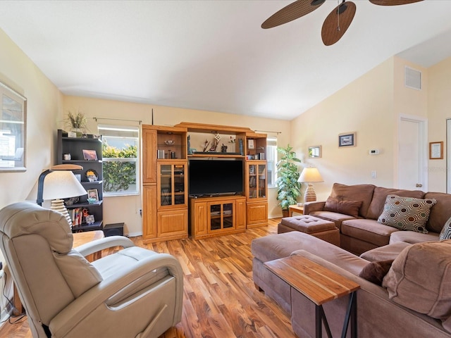 85 Long Meadow Ct, Rotonda West, FL 33947 - living room featuring light wood-style floors, ceiling fan, and lofted ceiling
