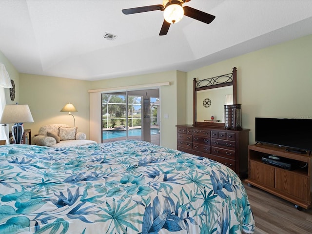 85 Long Meadow Ct, Rotonda West, FL 33947 - bedroom featuring access to exterior, wood finished floors, and a ceiling fan