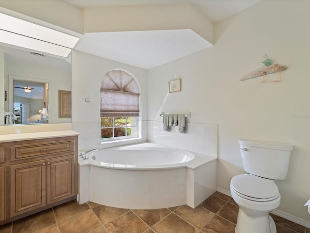 85 Long Meadow Ct, Rotonda West, FL 33947 - full bathroom with a garden tub, toilet, vanity, and a ceiling fan