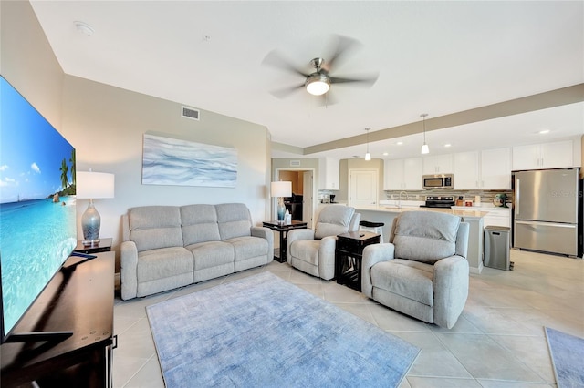 14271 Heritage Landing Blvd Unit 1516, Punta Gorda, FL 33955 - living room with a ceiling fan, light tile patterned floors, and recessed lighting