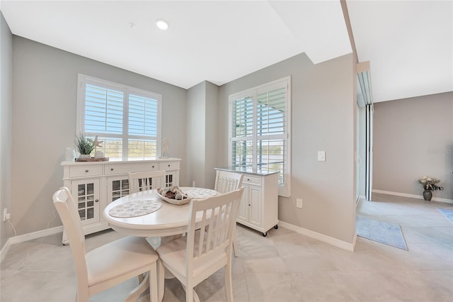14271 Heritage Landing Blvd Unit 1516, Punta Gorda, FL 33955 - dining room with baseboards and light tile patterned floors