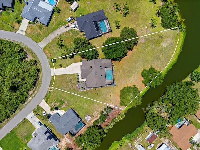 501 Fairmont Ter, Port Charlotte, FL 33954 - aerial view of residential area featuring a large body of water and property parcel outlined