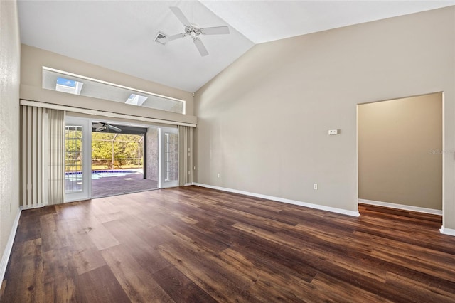 501 Fairmont Ter, Port Charlotte, FL 33954 - unfurnished room featuring ceiling fan, high vaulted ceiling, wood finished floors, a skylight, and baseboards