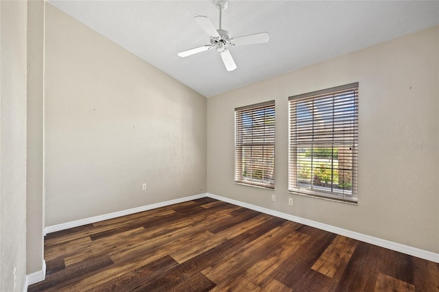 501 Fairmont Ter, Port Charlotte, FL 33954 - unfurnished room with lofted ceiling, dark wood-style flooring, baseboards, and a ceiling fan