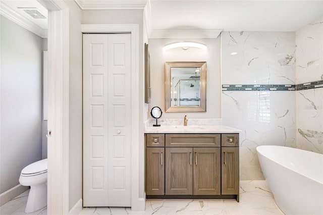 full bath featuring marble finish floors, toilet, a closet, a freestanding bath, and crown molding