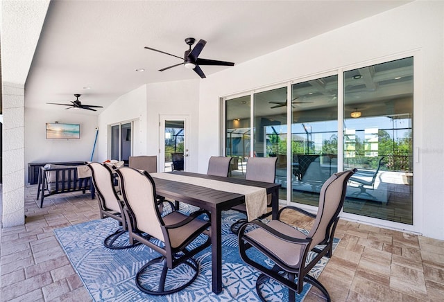 view of patio / terrace with a ceiling fan and outdoor dining area