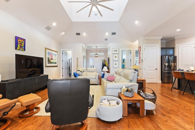 329 W Grace St, Punta Gorda, FL 33950 - living room featuring a ceiling fan, ornamental molding, light wood-style flooring, recessed lighting, and vaulted ceiling