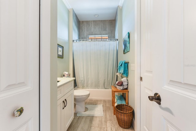 329 W Grace St, Punta Gorda, FL 33950 - bathroom with shower / tub combo, vanity, toilet, and wood finished floors