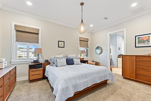 329 W Grace St, Punta Gorda, FL 33950 - bedroom featuring light colored carpet, ornamental molding, recessed lighting, baseboards, and ensuite bath