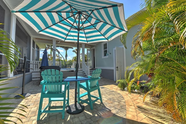 329 W Grace St, Punta Gorda, FL 33950 - view of patio / terrace with a covered hot tub