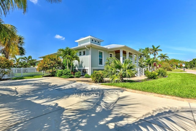 329 W Grace St, Punta Gorda, FL 33950 - view of front of home with covered porch and driveway