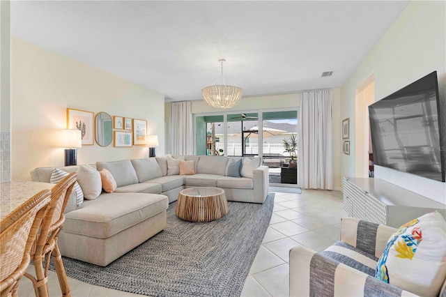 17629 Palmetto Pass Ln, Punta Gorda, FL 33982 - living room featuring a chandelier and light tile patterned flooring