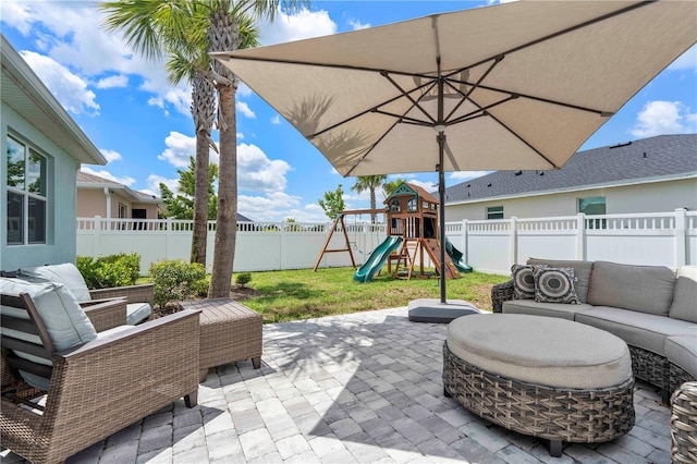 17629 Palmetto Pass Ln, Punta Gorda, FL 33982 - view of patio featuring an outdoor hangout area and a playground
