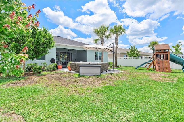 17629 Palmetto Pass Ln, Punta Gorda, FL 33982 - view of yard featuring a playground, outdoor lounge area, ceiling fan, and a patio area