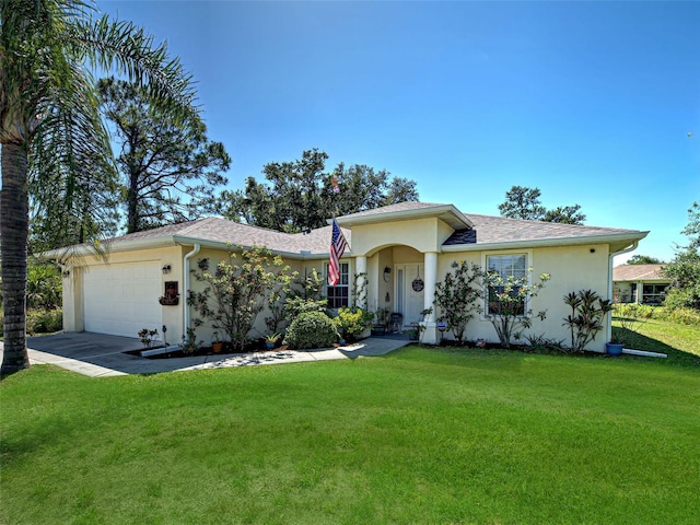 4092 Troost St, North Port, FL 34288 - single story home featuring stucco siding, an attached garage, a front yard, and driveway