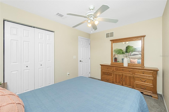 bedroom featuring carpet, a closet, and a ceiling fan
