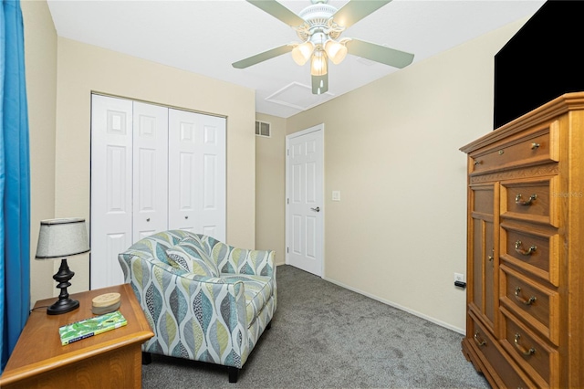 living area featuring carpet floors, ceiling fan, and baseboards
