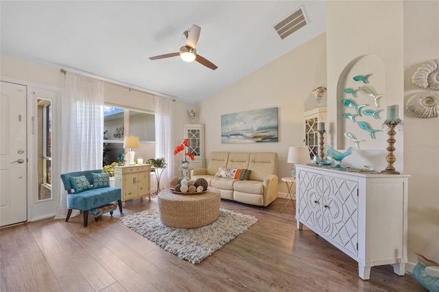 17396 Cox Ave, Port Charlotte, FL 33948 - living room featuring ceiling fan, lofted ceiling, and wood finished floors