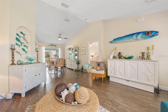 17396 Cox Ave, Port Charlotte, FL 33948 - living room featuring wood finished floors, vaulted ceiling, and ceiling fan