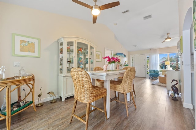17396 Cox Ave, Port Charlotte, FL 33948 - dining space with ceiling fan, vaulted ceiling, and wood finished floors