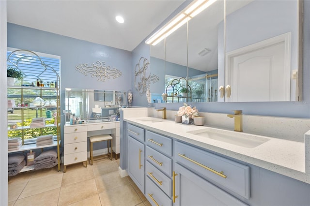 17396 Cox Ave, Port Charlotte, FL 33948 - full bath with double vanity, a shower stall, and tile patterned floors