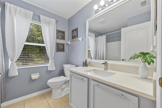 17396 Cox Ave, Port Charlotte, FL 33948 - bathroom featuring vanity, toilet, tile patterned floors, a shower with curtain, and baseboards