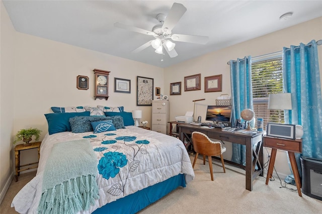 17396 Cox Ave, Port Charlotte, FL 33948 - bedroom with light carpet, a desk, ceiling fan, and baseboards