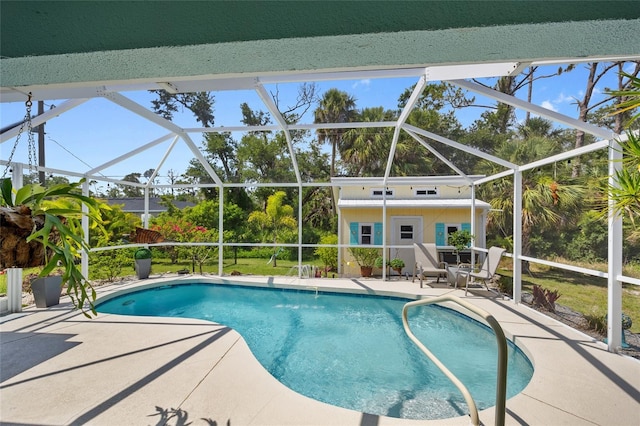 17396 Cox Ave, Port Charlotte, FL 33948 - outdoor pool with a patio area, an outdoor structure, and glass enclosure