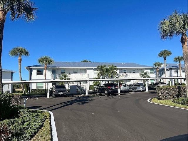 26430 Rampart Blvd Unit 511, Punta Gorda, FL 33983 - view of property with covered parking and a residential view