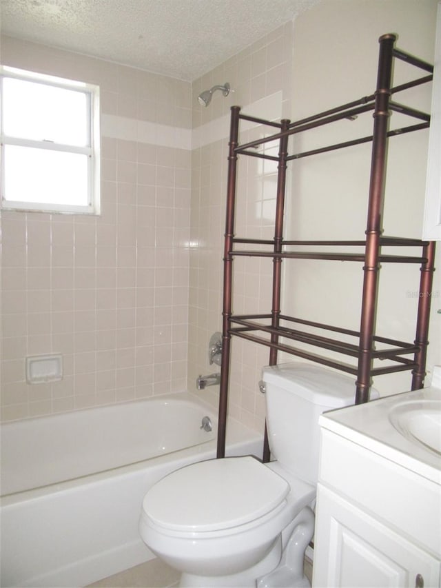 26430 Rampart Blvd Unit 511, Punta Gorda, FL 33983 - bathroom featuring toilet, a textured ceiling, shower / washtub combination, and vanity