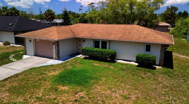 2119 Pellam Blvd, Port Charlotte, FL 33948 - single story home featuring stucco siding, an attached garage, concrete driveway, and a front lawn