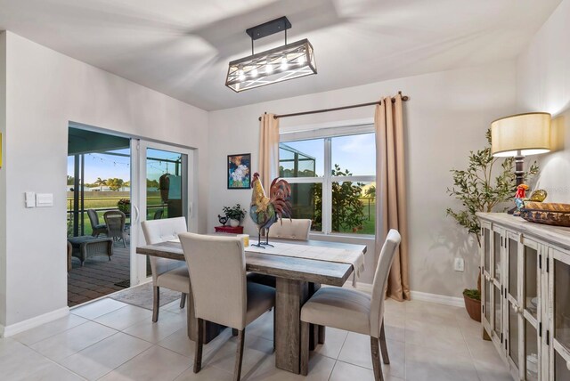 16032 Galiano Ct, Punta Gorda, FL 33955 - dining space with plenty of natural light, baseboards, and light tile patterned flooring