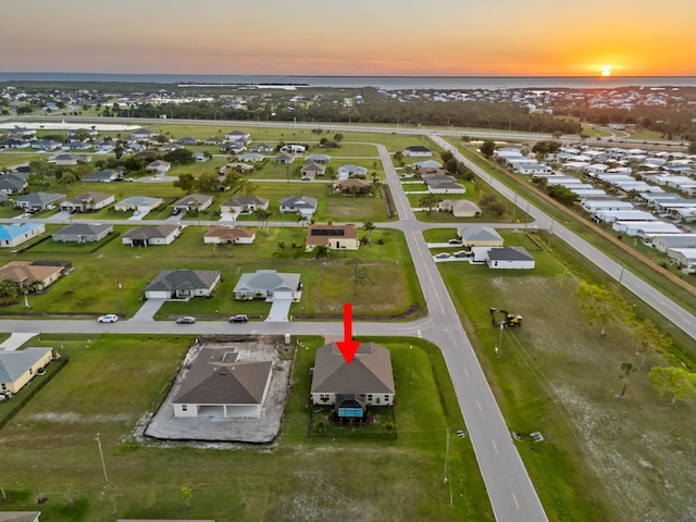 16032 Galiano Ct, Punta Gorda, FL 33955 - aerial view at dusk of a water view and a residential view
