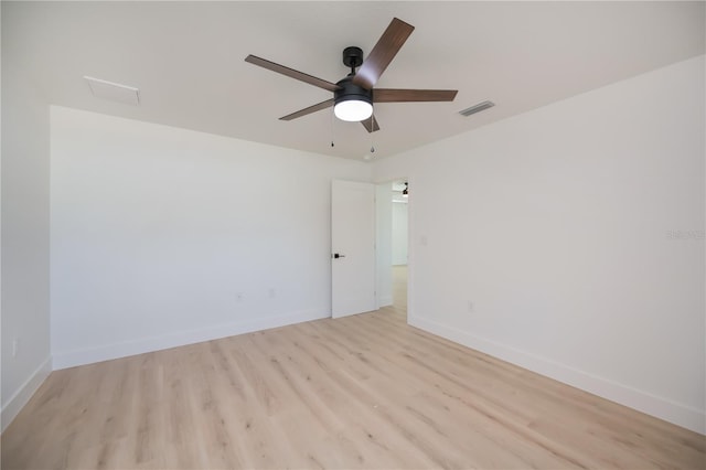 359 Salisbury St, Port Charlotte, FL 33954 - unfurnished room featuring light wood-type flooring, a ceiling fan, and baseboards