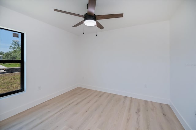 359 Salisbury St, Port Charlotte, FL 33954 - empty room with light wood-style floors, baseboards, and ceiling fan