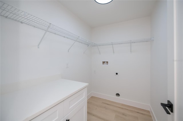 359 Salisbury St, Port Charlotte, FL 33954 - laundry room with hookup for a washing machine, light wood finished floors, hookup for an electric dryer, and baseboards