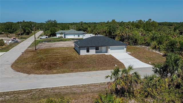 359 Salisbury St, Port Charlotte, FL 33954 - aerial view of property and surrounding area featuring a heavily wooded area
