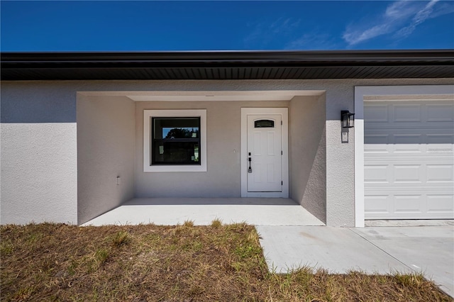 359 Salisbury St, Port Charlotte, FL 33954 - view of exterior entry featuring stucco siding