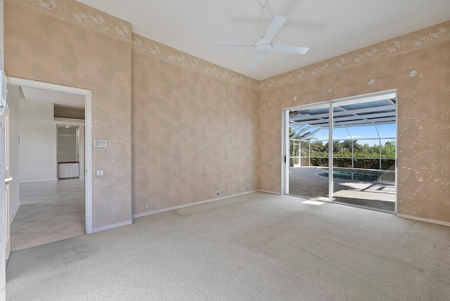 13783 Palmetto Point Ct, Port Charlotte, FL 33953 - unfurnished room featuring carpet floors, a ceiling fan, baseboards, and a sunroom