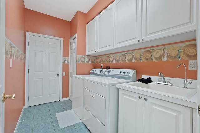13783 Palmetto Point Ct, Port Charlotte, FL 33953 - washroom featuring cabinet space, washing machine and dryer, light tile patterned floors, and baseboards