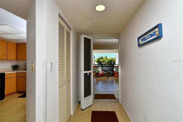 601 Islamorada Blvd Unit 24B, Punta Gorda, FL 33955 - hallway with baseboards