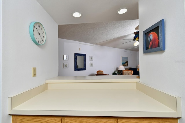 601 Islamorada Blvd Unit 24B, Punta Gorda, FL 33955 - bathroom featuring ceiling fan and a textured ceiling