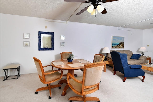 601 Islamorada Blvd Unit 24B, Punta Gorda, FL 33955 - dining space with light carpet, a textured ceiling, and ceiling fan