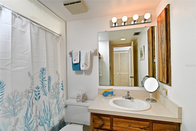 601 Islamorada Blvd Unit 24B, Punta Gorda, FL 33955 - full bath featuring vanity, toilet, and a shower with shower curtain