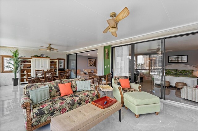 3250 Southshore Dr Unit 54B, Punta Gorda, FL 33955 - living area with a ceiling fan and marble finish floors