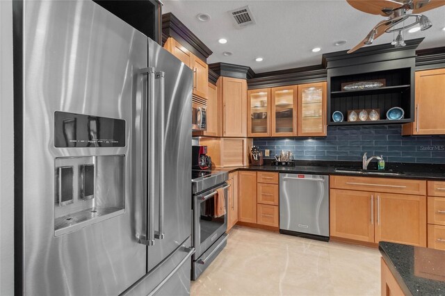 3250 Southshore Dr Unit 54B, Punta Gorda, FL 33955 - kitchen featuring appliances with stainless steel finishes, a sink, backsplash, and open shelves