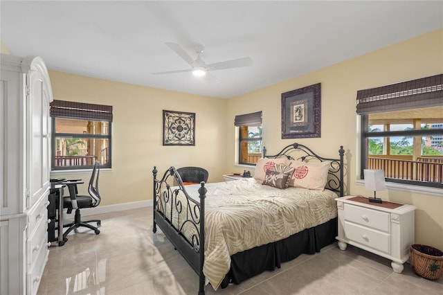 3250 Southshore Dr Unit 54B, Punta Gorda, FL 33955 - bedroom with multiple windows, ceiling fan, and baseboards